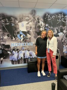 Hopkins alum Katharine Phares with senior women's lacrosse player Bailey Cheetham