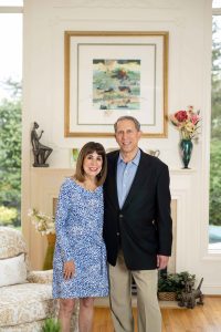 hopkins alum and donor mindy farber stands in her home with husband john camp