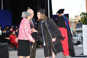 saralynn glass congradulates annaliese neaman at the johns hopkins school of education commencement